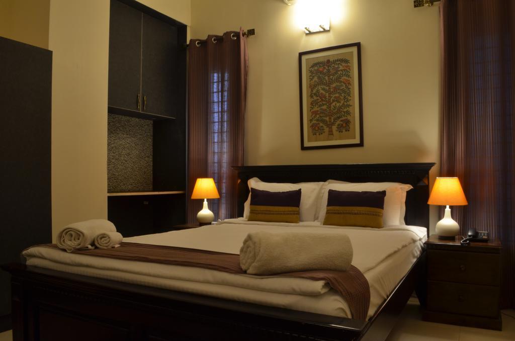 Luxtay Suites Bangalore Zimmer foto