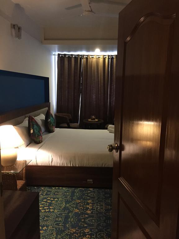 Luxtay Suites Bangalore Zimmer foto