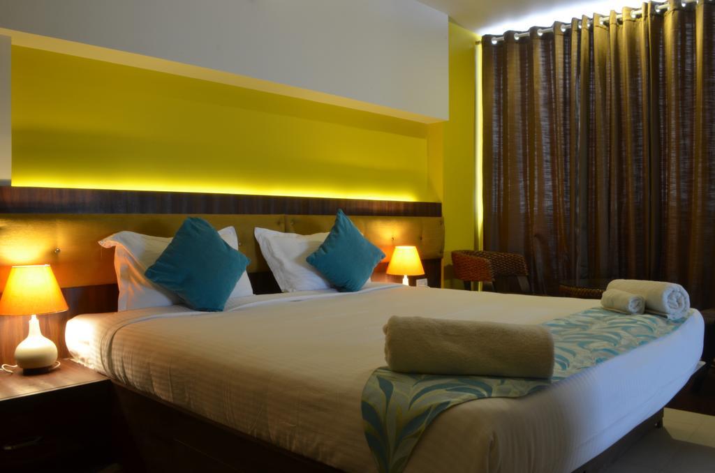 Luxtay Suites Bangalore Zimmer foto